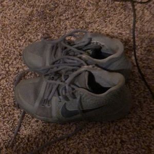 Size is four and the brand is Nike